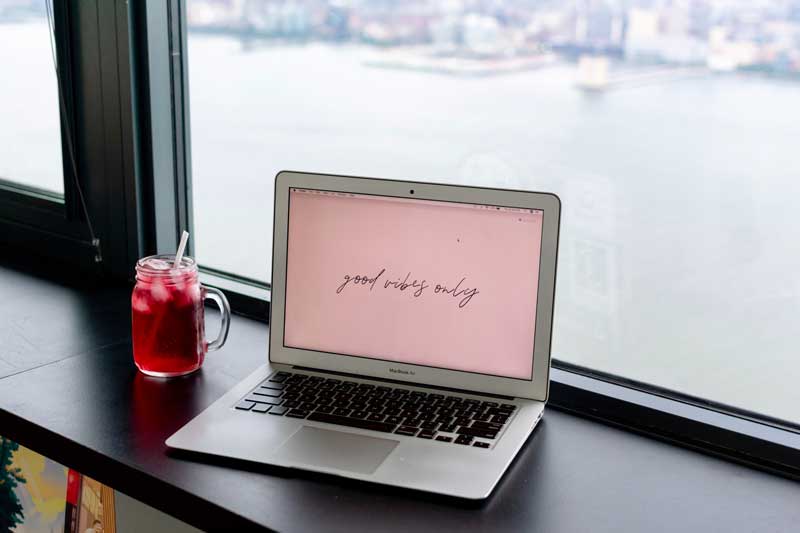 Picture of a laptop spreading the good vibes we all need