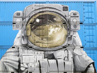 Astronaut painted on shipping containers